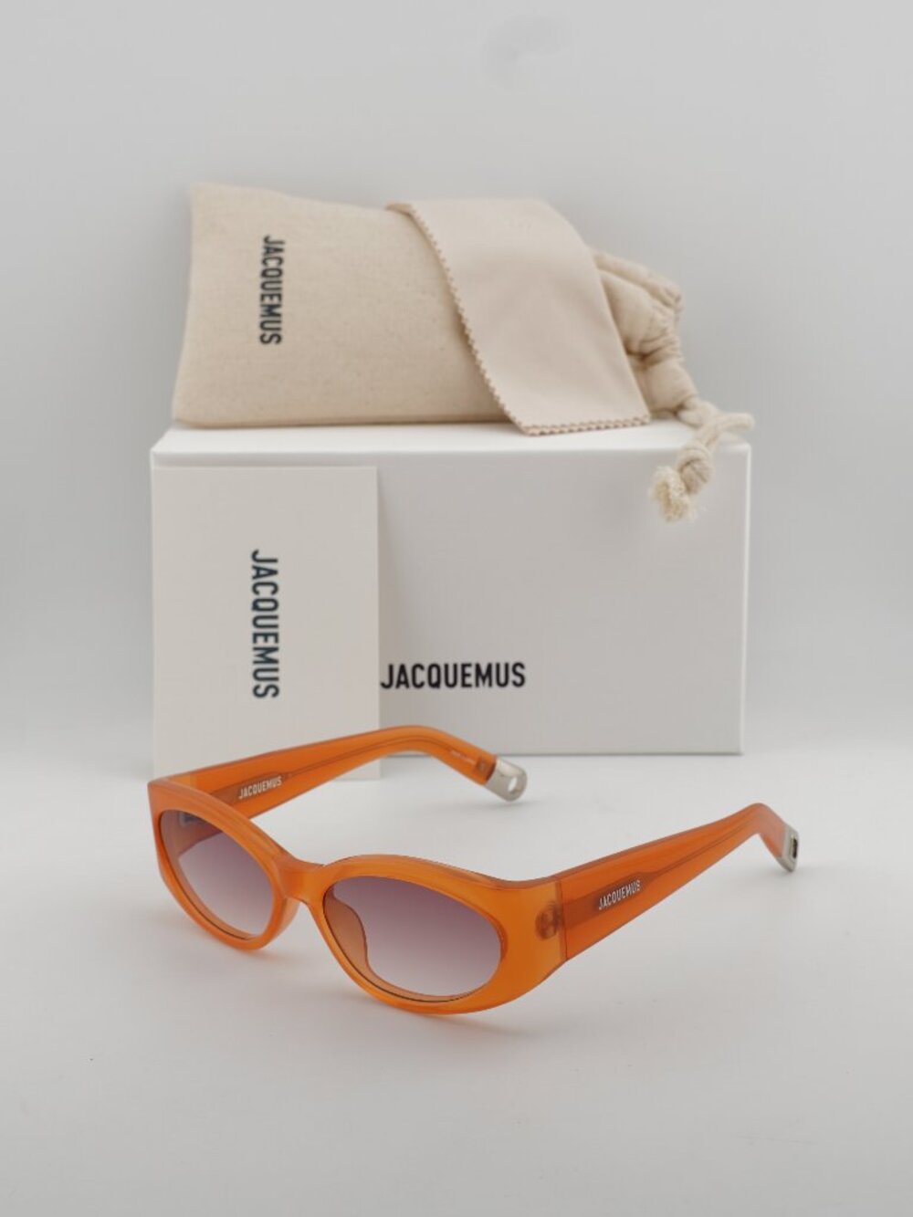 Jacquemus OVALO JAC/4 C10 Cat Eye Sunglasses - Milky Amber / Plum